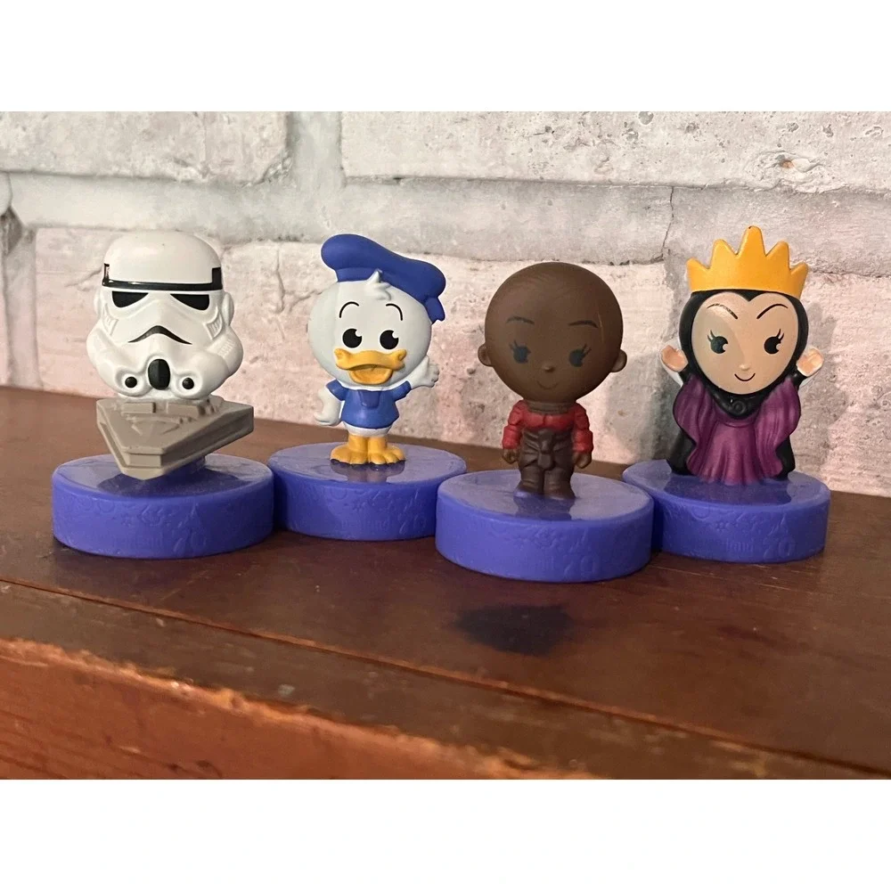 Lot of 4 McDonald's Disneyland 70th Storm Trooper Okoye Evil Queen Donald Duck